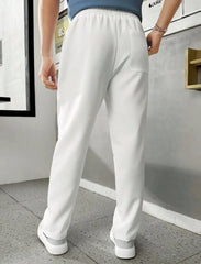 MEN SOLID COLOR DRAWSTRING WAIST SHUTTLE-WOVEN CASUAL PANTS